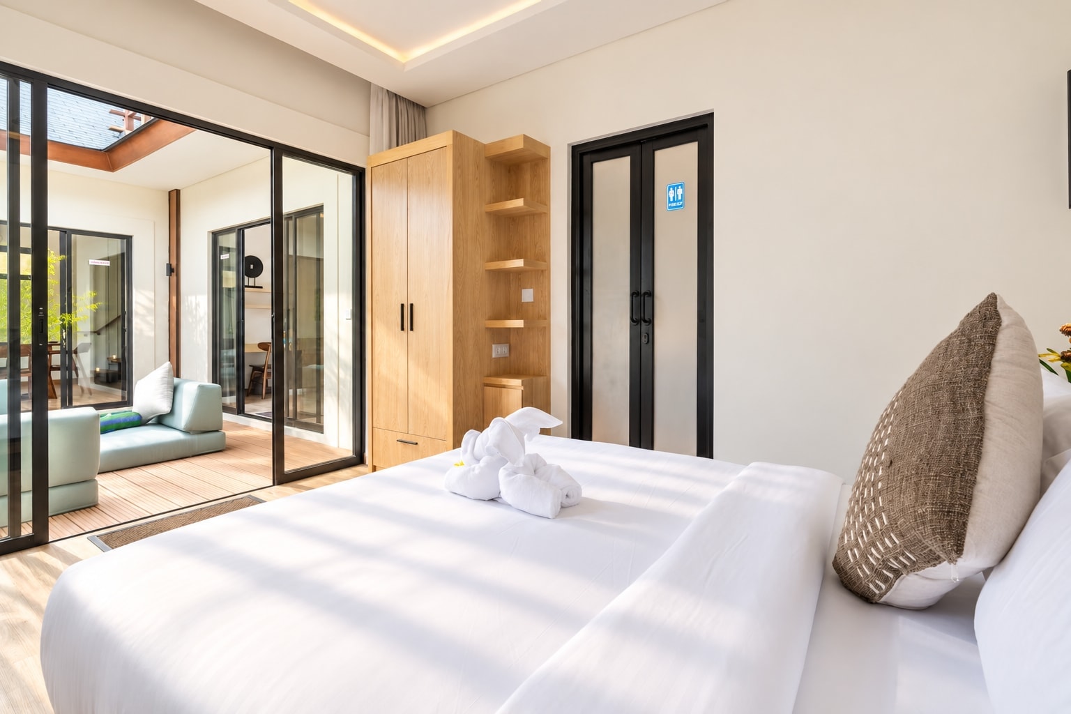 From the queen bed through the sliding doors to the deck and lounge