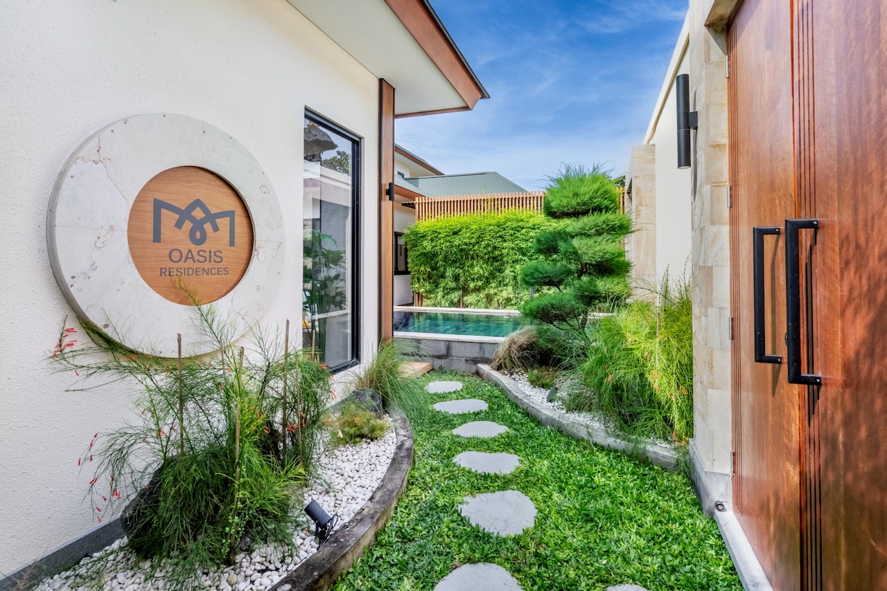 Stepping stones through the walled garden between the two villas