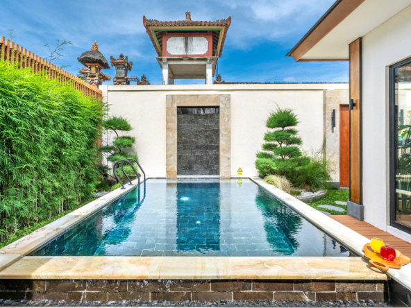 Modern Balinese villa with courtyard pool and waterfall feature