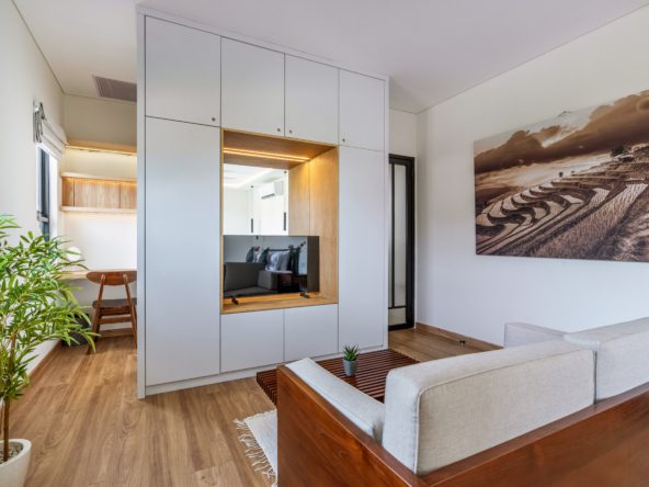 Master bedroom with private relaxing area, workspace and bathroom